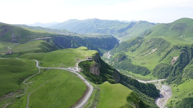 Caucasus mountains. Georgian Military Road. Kudskoe or Gudskoe gorge and extinct Sherkhot volcano on the Kelsk volcanic plateau. Jvari pass near the ski resort Gudauri.