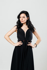 Beautiful woman posing in black dress