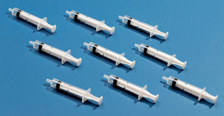 Flat lay syringe collection of vaccines
