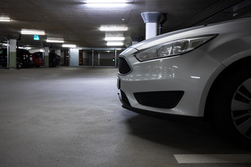 Fototapeta na wymiar Underground parking/garage (shallow DOF; color toned image)