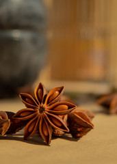 
spice star anise, whole stars, on brown background