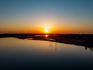 Beautiful areal drone view of sunset and river Lielupe.
