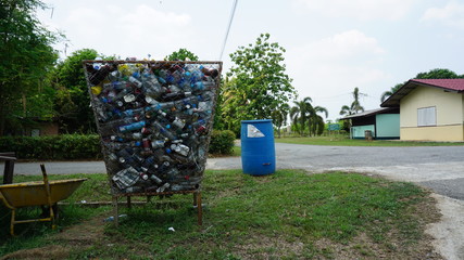 Bucket for collecting plastic waste bottles