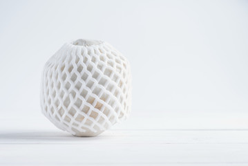 Tropical drinking coconut on white wood background.