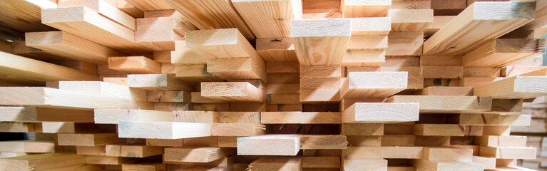 Warehouse with products of woodworking boards and timber