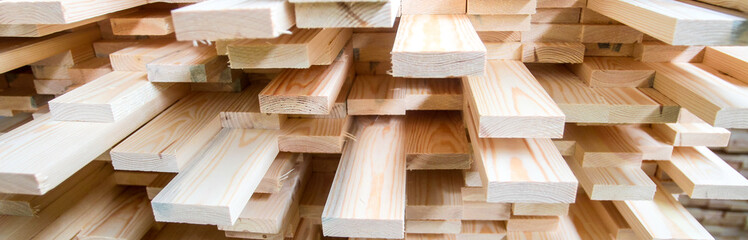 Warehouse with products of woodworking boards and timber