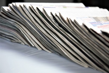 stack of newspapers