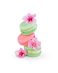 Macaroons isolated on a white background with spring flower