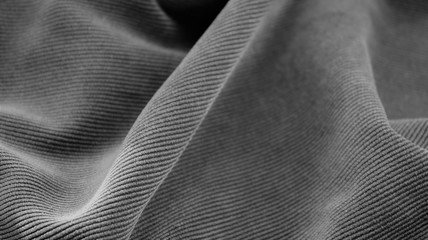 soft folds of fabric, black-gray background for design