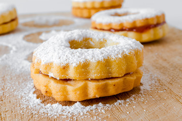 Nice, cute homemade linzer cookies with powder sugar.