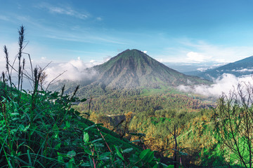 Photograph of high volcano with clouds on Java island