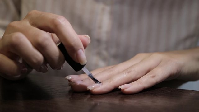 fingernails with gel painting close up. Stock footage of nails gel painting.
