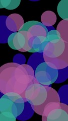 Multicolored translucent circles on a dark background. 3D illustration