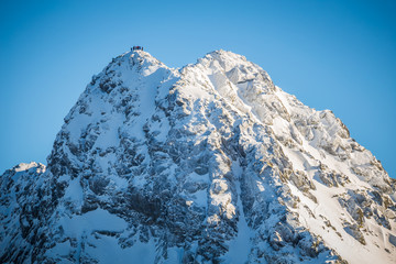 Szczyt Świnicy zimą w Tatrach Wysokich - obrazy, fototapety, plakaty