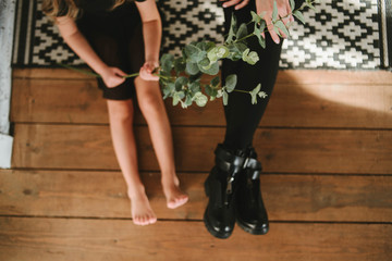 Mom and daughter's legs, no trick photo