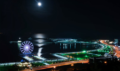 night panorama of Baku coast and promenade with moonlight