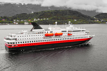 Famous Norwegian Hurtigruten on classic post ship or cruiseship or cruise ship liner MS Nordnorge...