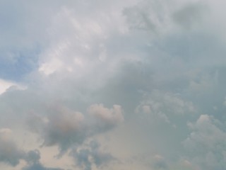 black and white clouds with blue sky