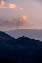 Mountains are lit by the setting sun in the Tusheti region.