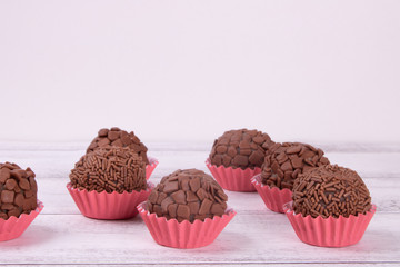 Typical Brazilian sweet brigadeiro with white background