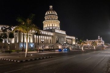 Night View Of National Capital Building, Tourist, Traffic In Havana, Cuba.