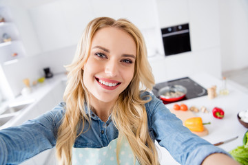 Hello dear followers. Closeup photo of beautiful housewife making selfies recording video vlog cooking blogger tasty vegan meal quarantine stay home time kitchen indoors