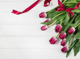 Bouquet of purple tulips on a white background