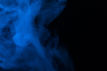 Blue steam on a black background.