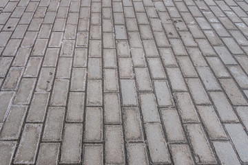 abstract background of tiles on the sidewalk close up