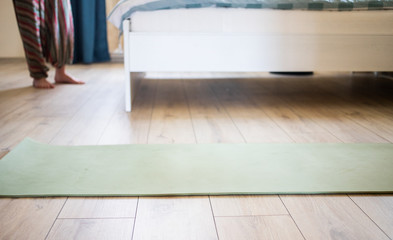 woman doing yoga at home