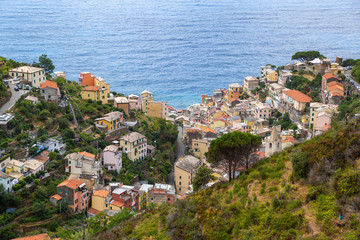 Manarola village, Cinque Terre, Italy, rocks and sea.