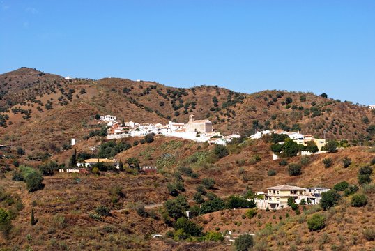 View of small town, pueblo blanco (whitewashed village), Benaque, Andalusia, Spain.