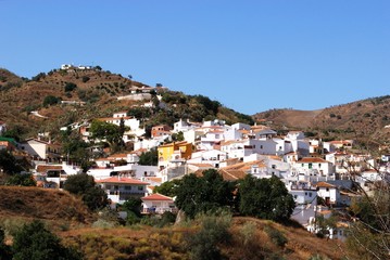 Fototapeta na wymiar View of the whitewashed village and surroiunding countryside, Cazij, Andalusia, Spain.