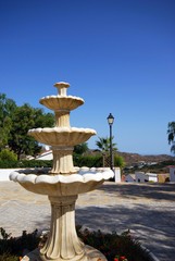 Fountain in a small plaza in the white village (pueblo blanco), Macharaviaya, Andalusia, Spain.