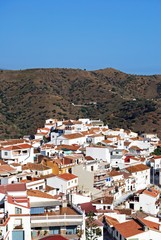 Elevated view of the whitewashed village (pueblo blanco), Moclinejo, Andalusia, Spain.