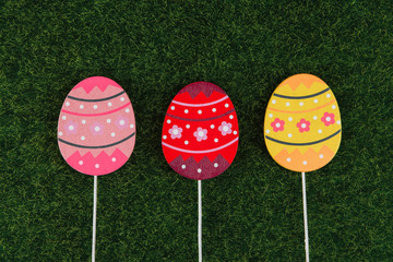 Easter eggs on the background of green grass
