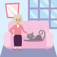 elderly woman in the living room with a cat