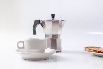 coffee maker white breakfast cup and cookies on background