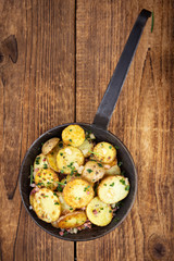 Fresh made Fried Potatoes (selective focus; close-up)