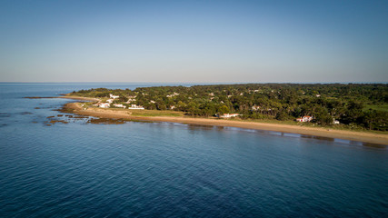 Fototapeta premium Beautiful and warm beach at sunset on an island, France, West coast