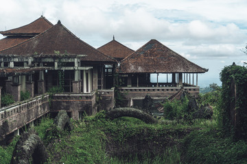abandoned building with dirty walls and broken roof
