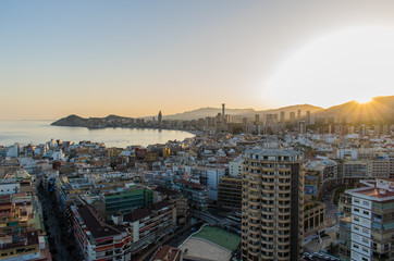 Benidorm, Spain - July 12, 2018: Sunset on the City Skyline from above. Aerial view.
