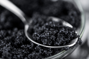 Slate slab with Black Caviar (selective focus; close-up shot)