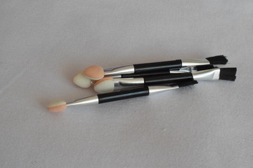 Makeup brush on a white background. The view from the top. 
