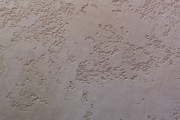 textured decorative stucco wall closeup. background picture on the wall