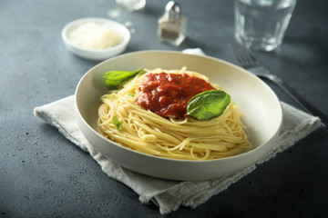 Pasta with tomato sauce and basil