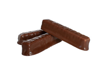 Dessert for tea. sweet brown chocolate wafers with caramel on a white background. isolate