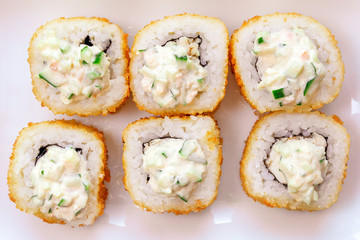 tempura roll cooked in batter and deep-fried. the view from the top. sushi Japanese cuisine menu