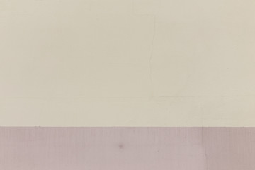 Plaster wall texture background or backdrop with purple stripe of paint