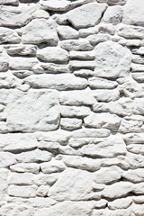 Texture of whitewashed stone masonry